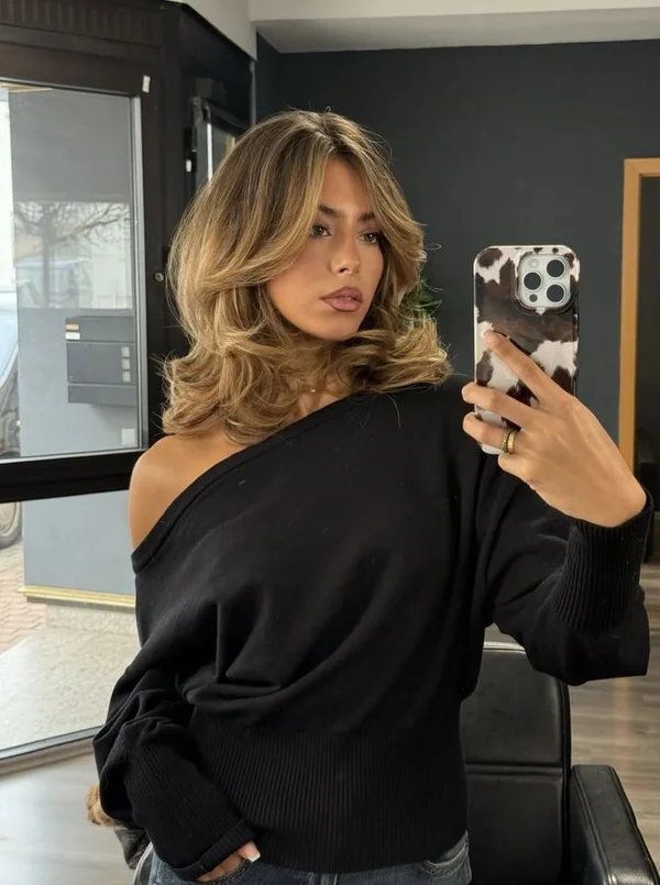 Стрижка з чубчиком-занавіскою